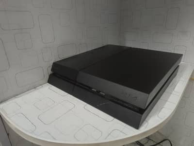 PS4 FAT with all accessories and 4 games available
