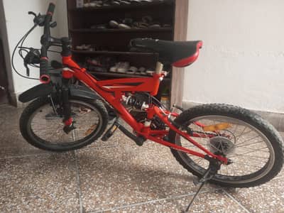 Mountain bike  Age 8 to 15      Height: ~4.5 ft to 5.