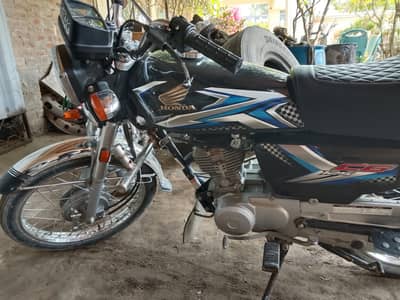 125 CC Honda sale argent    Condition 100%