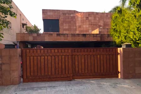 1 KANAL STONE ELEVATION OWNER BUILD IRON HOUSE DOUBLE UNIT IN PHASE 2 DHA ORIGNAL PICTURE