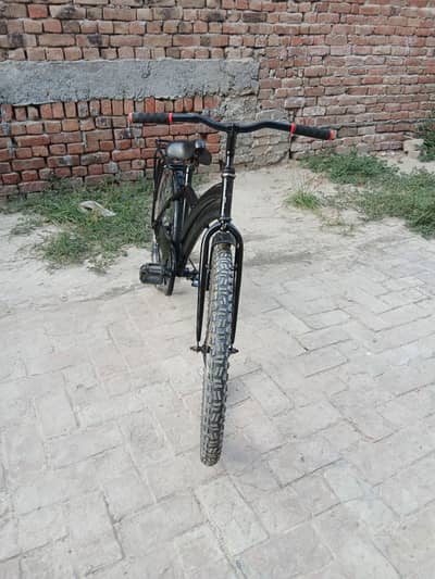 restored cycle with old mudguard. chimpta and chain cover
