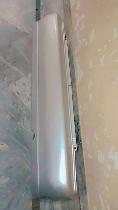 Suzuki Mehran Rear Genuine bumper in good condition.