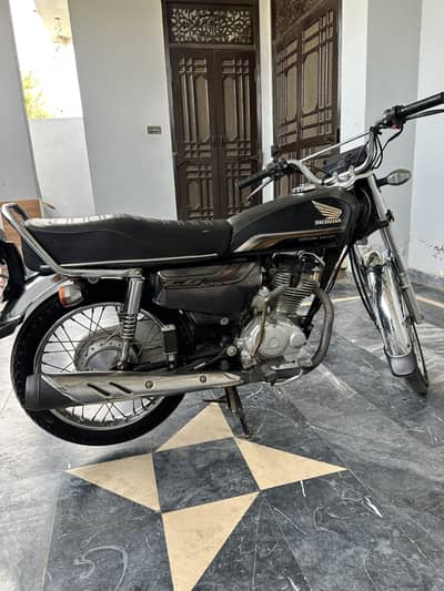 Honda 125 self start total genuine
