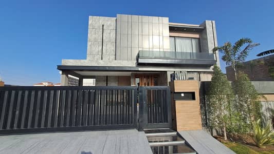 One Kanal Slightly Used Ultra Modern Designer Owner Build Fully Furnished Bungalow 25KV Solar Installed For Sale At Prime Location Of DHA Lahore Near To Park Masjid & Commercial Market.