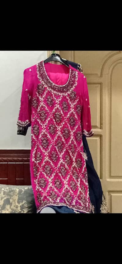 heavy kam Wala dress ha order p Tyar hua ha. stone and dabka ka kam ha