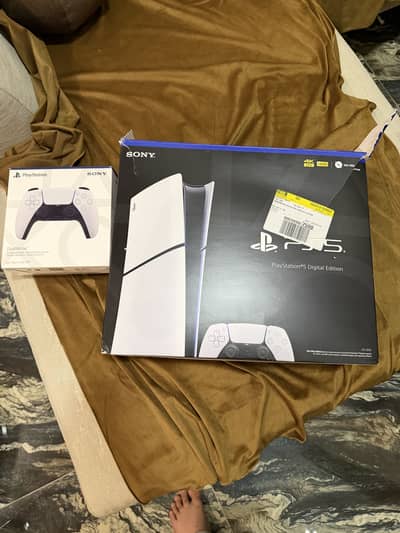 PlayStation 5 Digital 1TB with two controllers only box opened