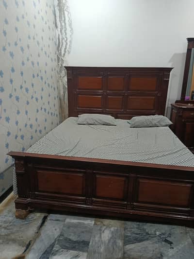 king size bed with dressing table and side table