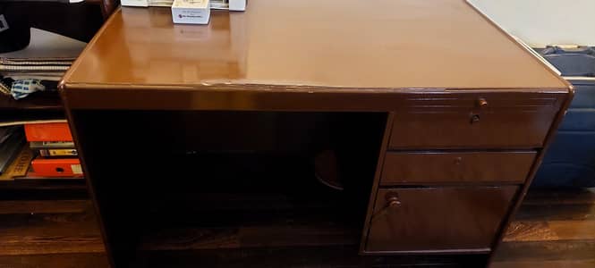 Office Table and  books rack.