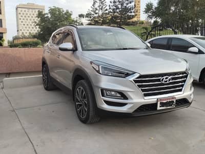 Hyundai Tucson FWD GLS Sport; Silver Metallic; Model 2023–First Owner