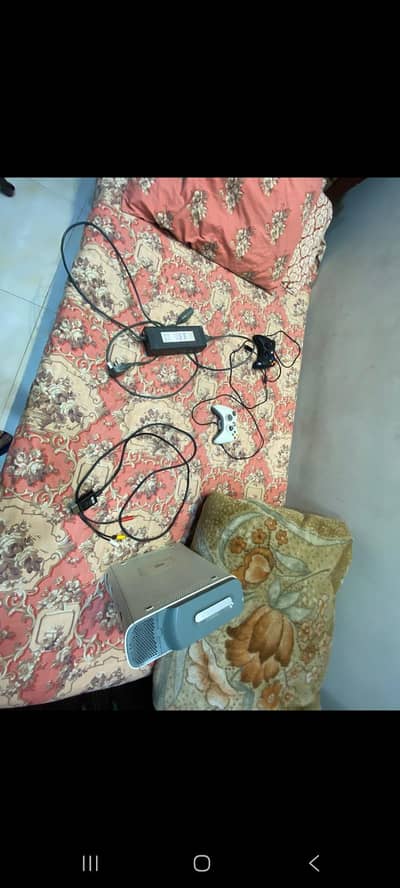 x box 360 with 2 controllers and more than 25 games