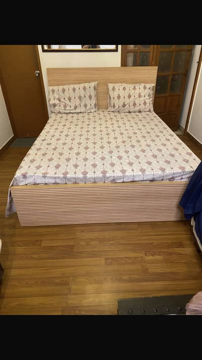 A unique and simple modern bed with mattress in A-One condition.