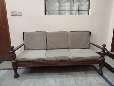 Heavy wooden sofa