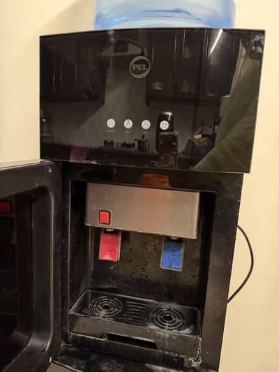 Free delivery good conditioned water dispenser.