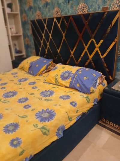 bed with side tables and spring mattress