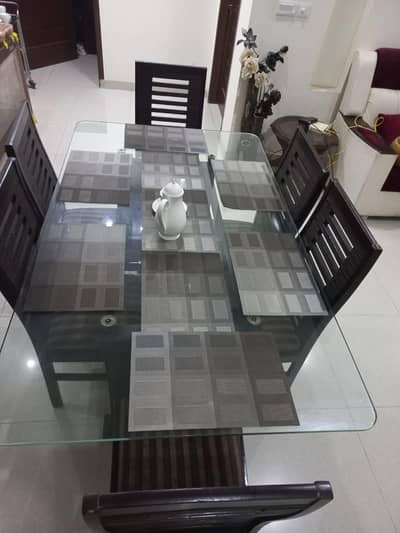 wooden dining table with 6 chairs