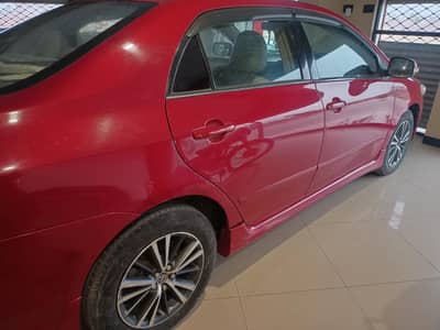 Corolla Altis 1.8 Full option sunrof