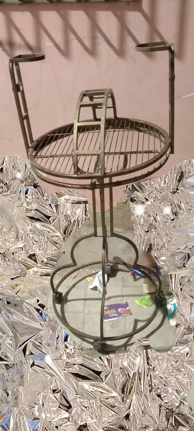 grey and macow sitting stand