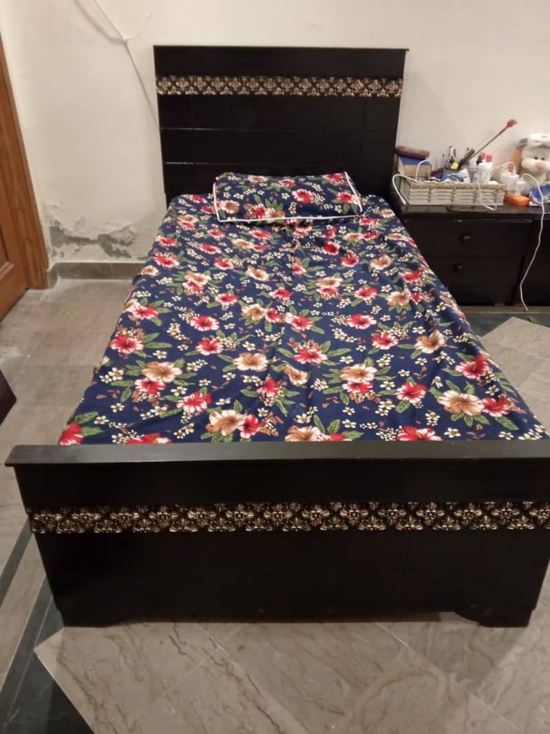 single bed with side table 0