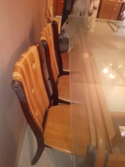 Selling my just like new dinning table with 8 chairs