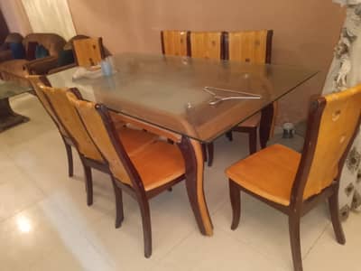 Selling my just like new dinning table with 8 chairs