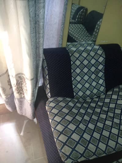 sofa with diwan and rug