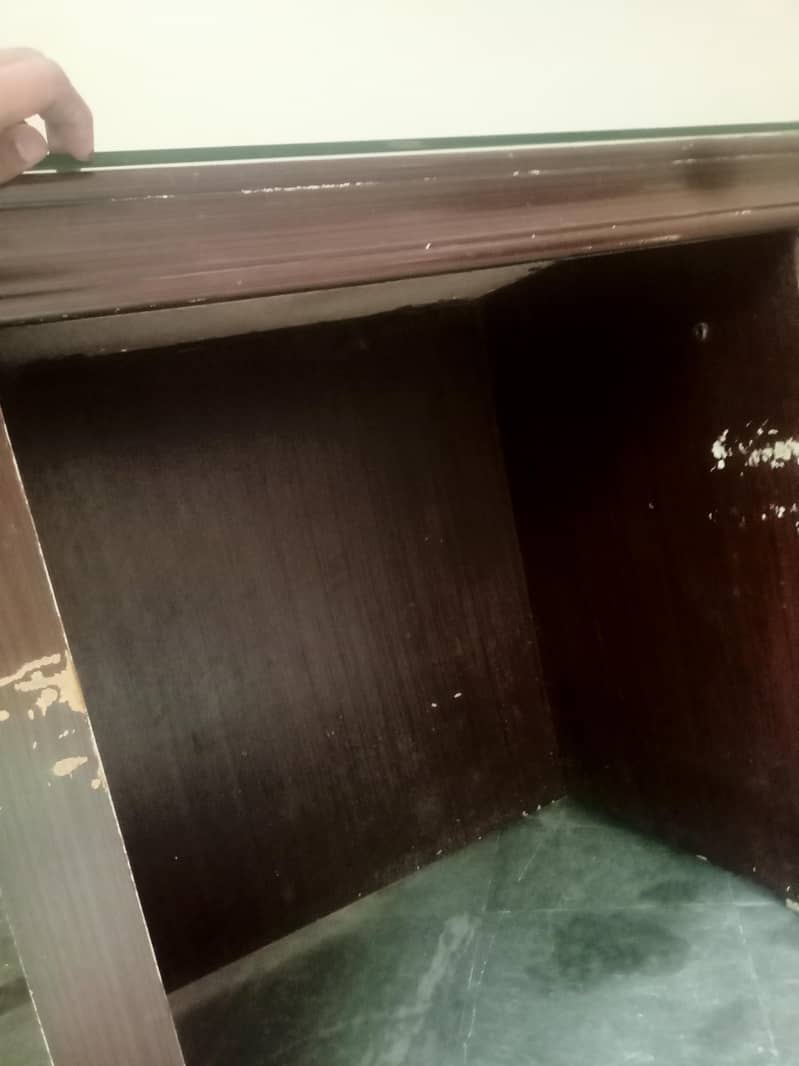 Solid office Table with clean glass on upper side. 2