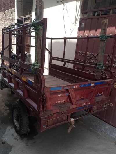 new asia loader 150cc new brand condition. lattr 2tan load compacity.