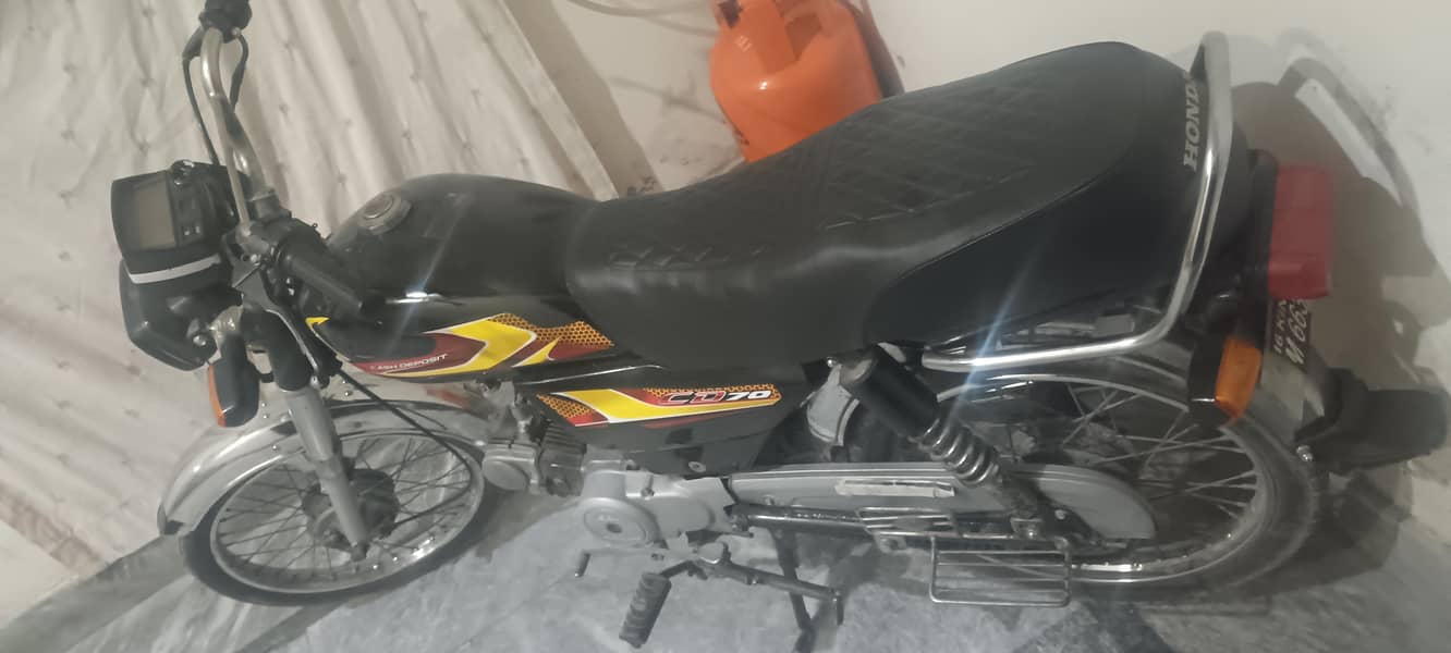 Dhoom 70cc 5