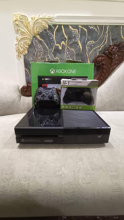 “Xbox One 1TB Excellent Condition with wireless Controllers"