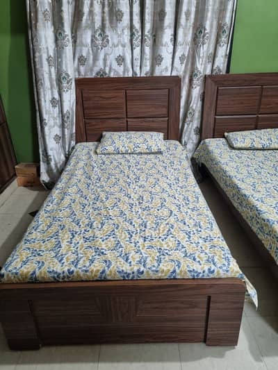 Two single beds for sale with mattress