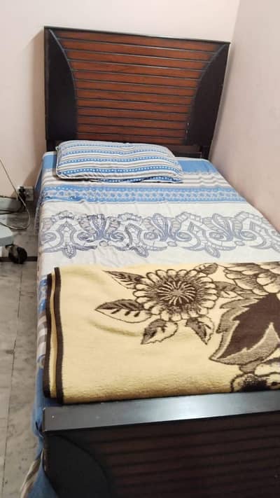 wooden single bed