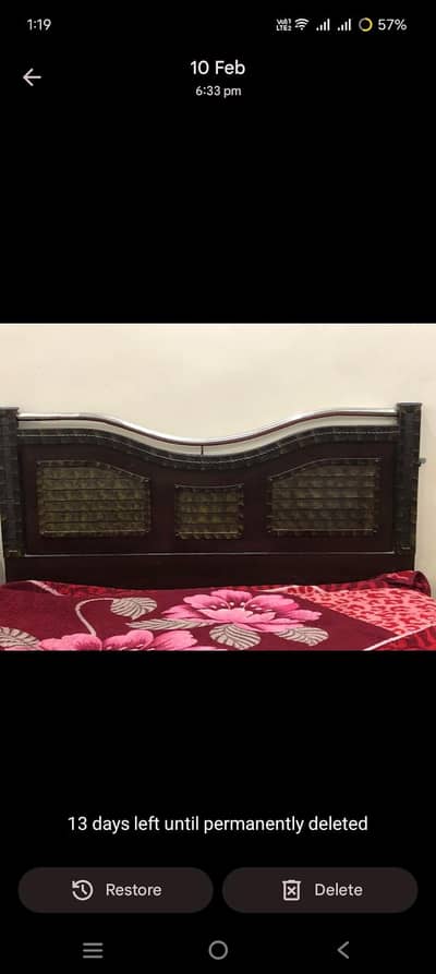 wooden bed without matress