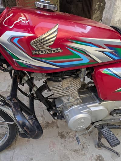 Honda 125 Red Coluor