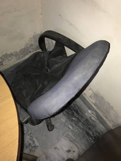 Black swivel , revolving office chair