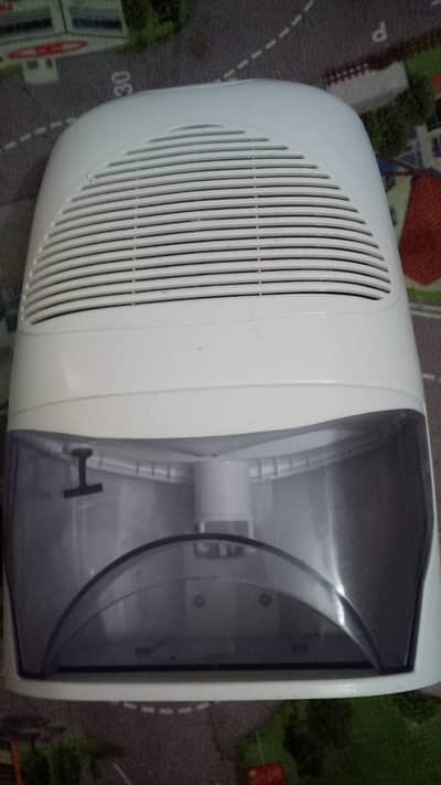 Electric 2 Litre Mini Dehumidifier. Compact & Portable  Damp & Moistur