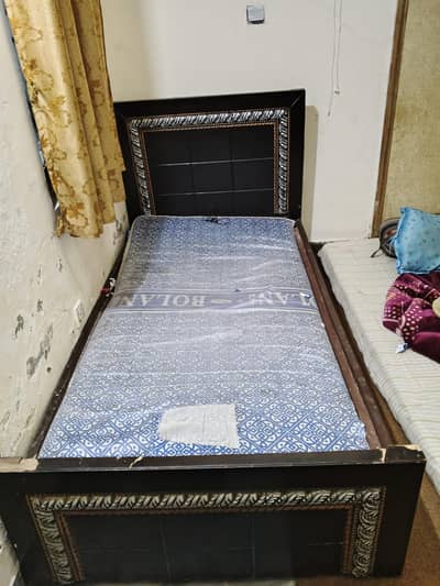 single wooden bed for sale