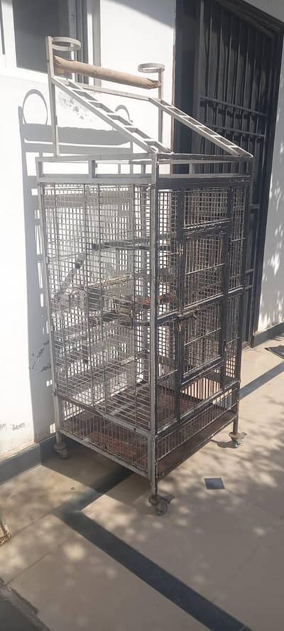 big bird cage with play area at top