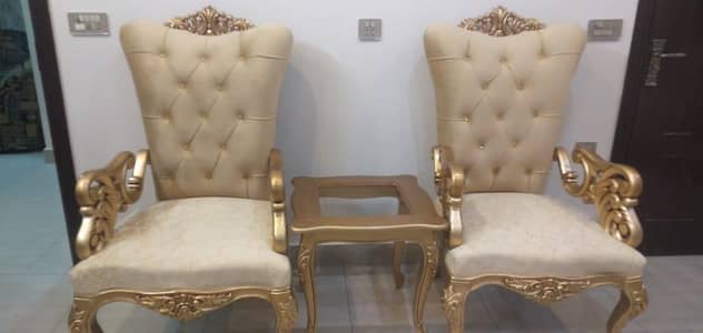 2 Heavy Wooden carving chairs with center table for sale