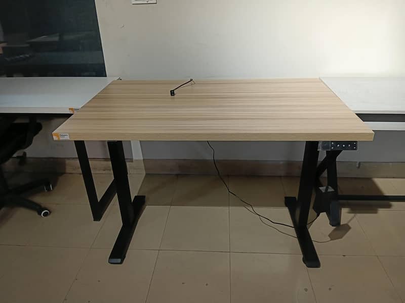 Height adjustable table 12