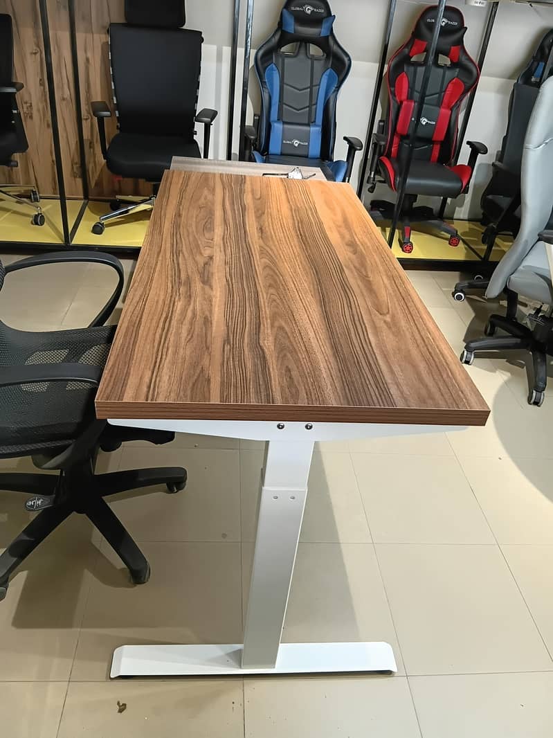 Height adjustable table 18
