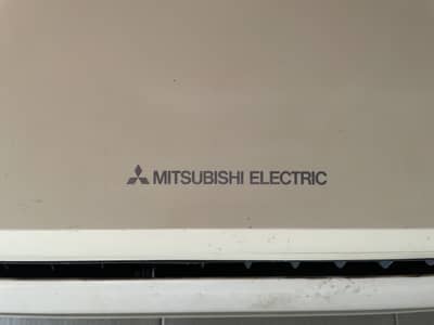Mitsubishi 1.5 Ton slightly used
