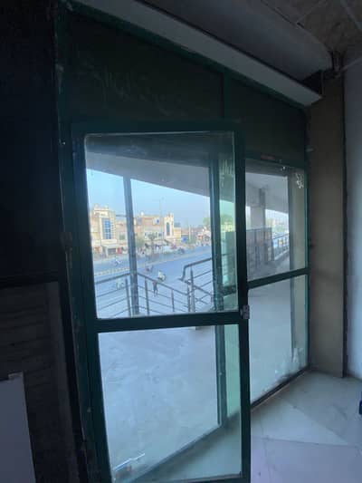 Glass door with iron frame
