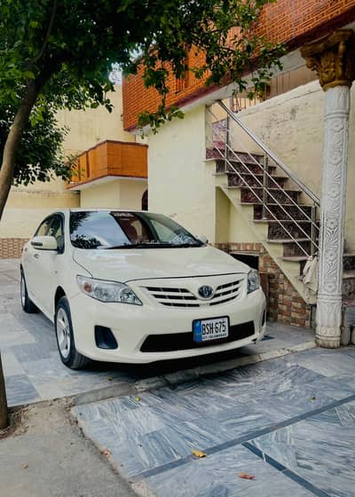 Toyota Corolla GLI 2012 iner total janwan otr 3 pees touch hy