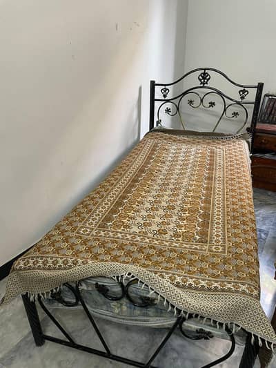 Rod iron single bed with spring mattress