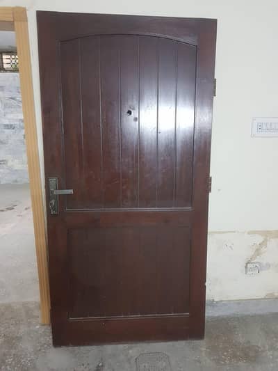 used wood door with look and three keys.
