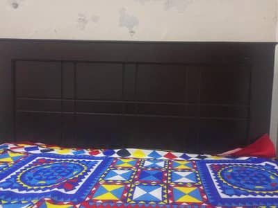 wooden singel bed  dark brown colour
