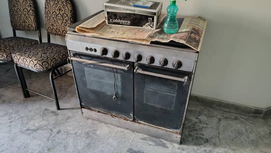 Old stove, works perfectly fine but body is rusted