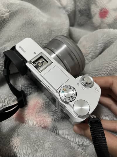 Brand new Sony a6000 with kit lens and Sony E50mm f1.8 OSS lens