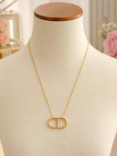 Golden twin loop pendant