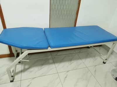 Patient bed and waiting chairs